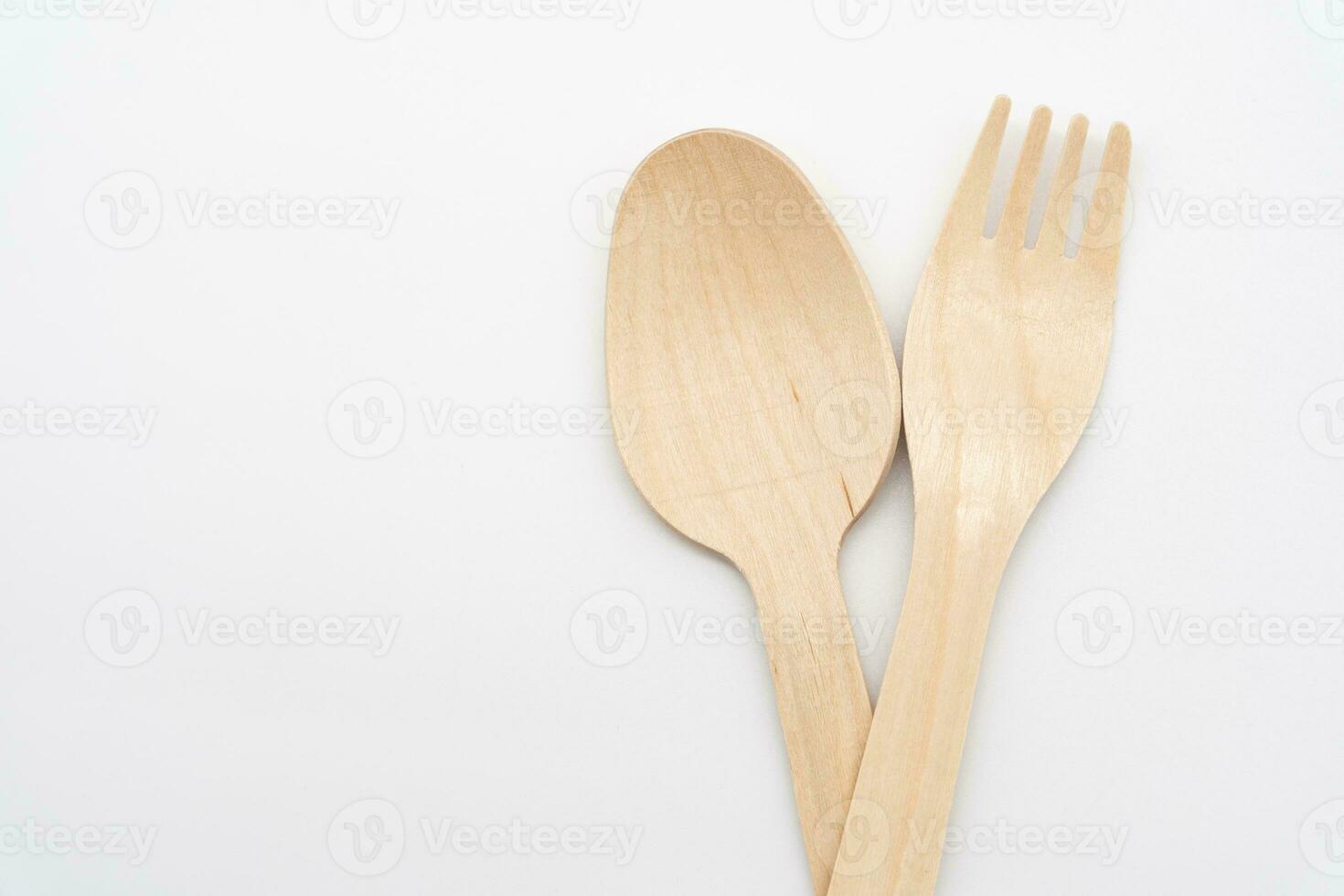Wooden Cutlery, Eco Tableware, Disposable Cutlery, Recycle. Eco food packaging concept, zero waste paper, sustainability. photo