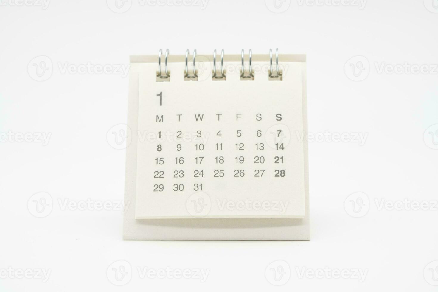 Simple desk calendar with no year isolated on white background. Calendar concept with copy space. photo