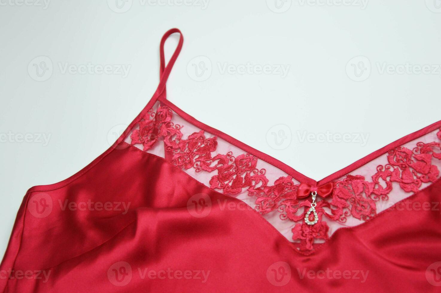 Lingerie. Red silk negligee with lace on a white background. Element of  finishing of a women's sexy nightgown. 36081978 Stock Photo at Vecteezy