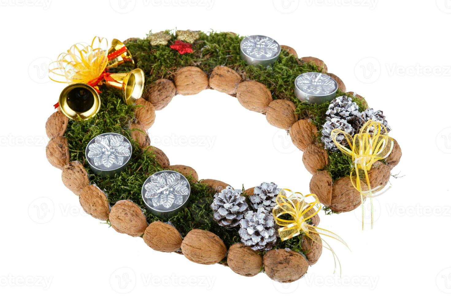 Christmas wreath made of moss in the shape of a horseshoe isolated on white background photo