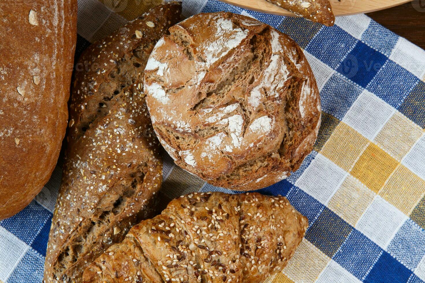 Group of different types of bread and bakery products photo