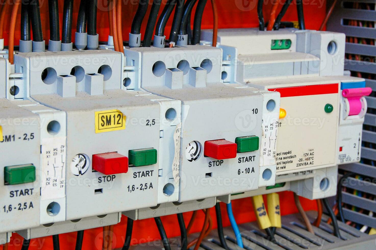 Electrical equipment. Automatic circuit breakers in a row. Electric switches in fusebox. photo