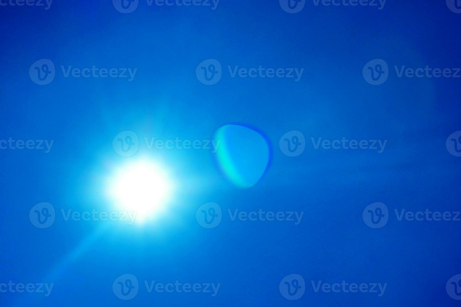Clouds in the blue sky with sunny background. Blue sky with white clouds Bright sun background. photo