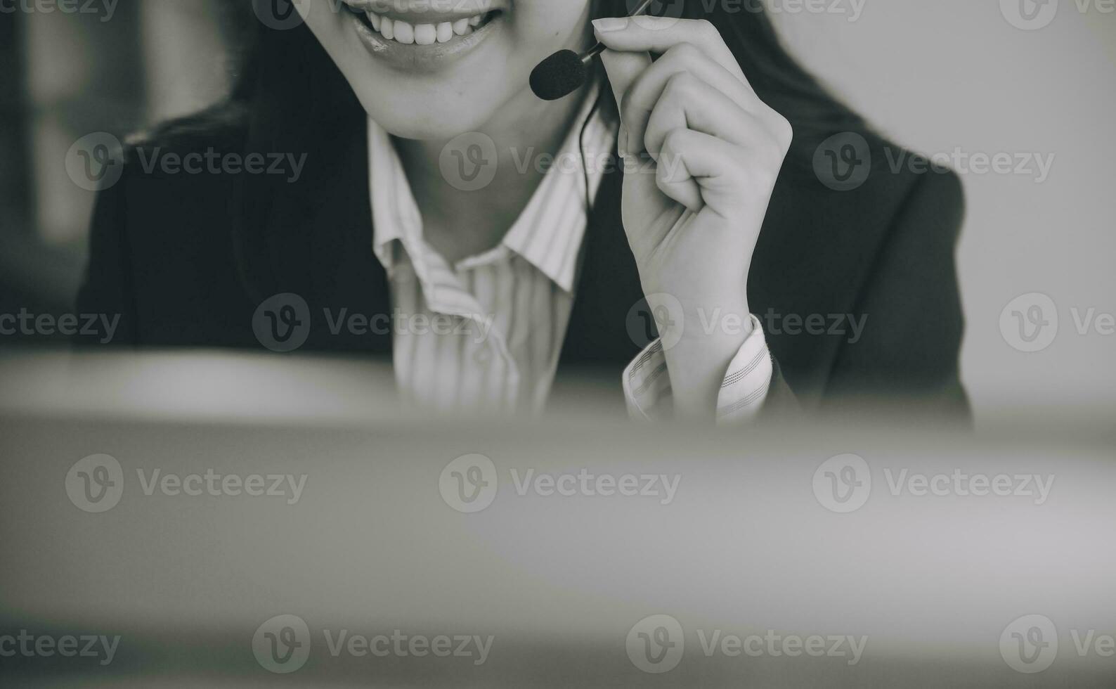 Communication support, call center and customer service help desk. VOIP headset on telephone keyboard. photo