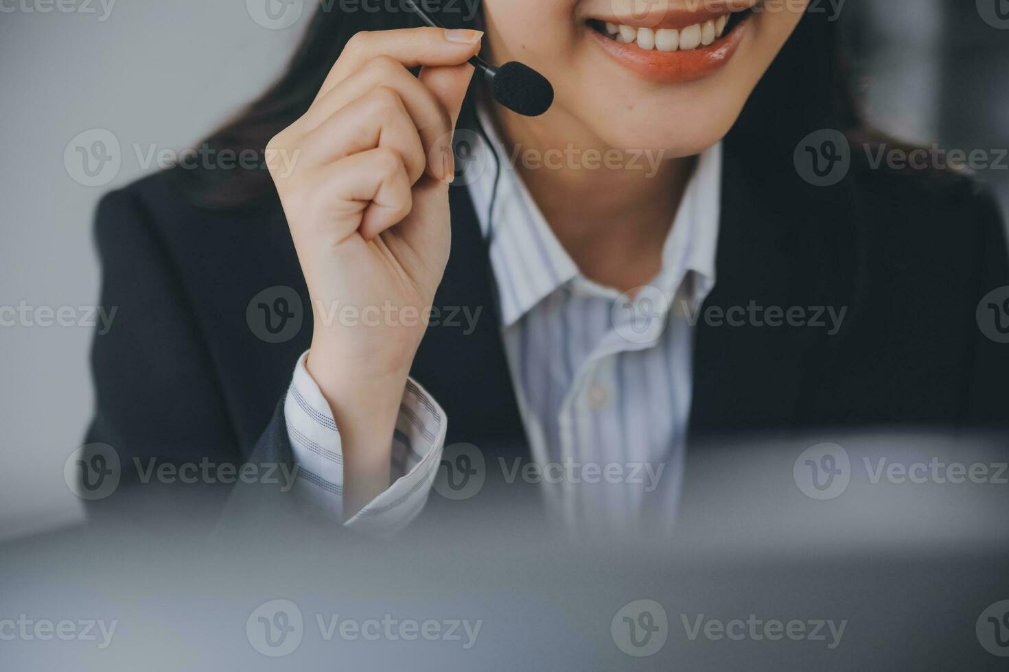 Communication support, call center and customer service help desk. VOIP headset on telephone keyboard. photo