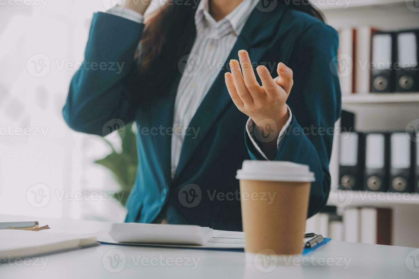 Thinking about how to take the business to technological heights. Cropped shot of an attractive young businesswoman working in her office. photo