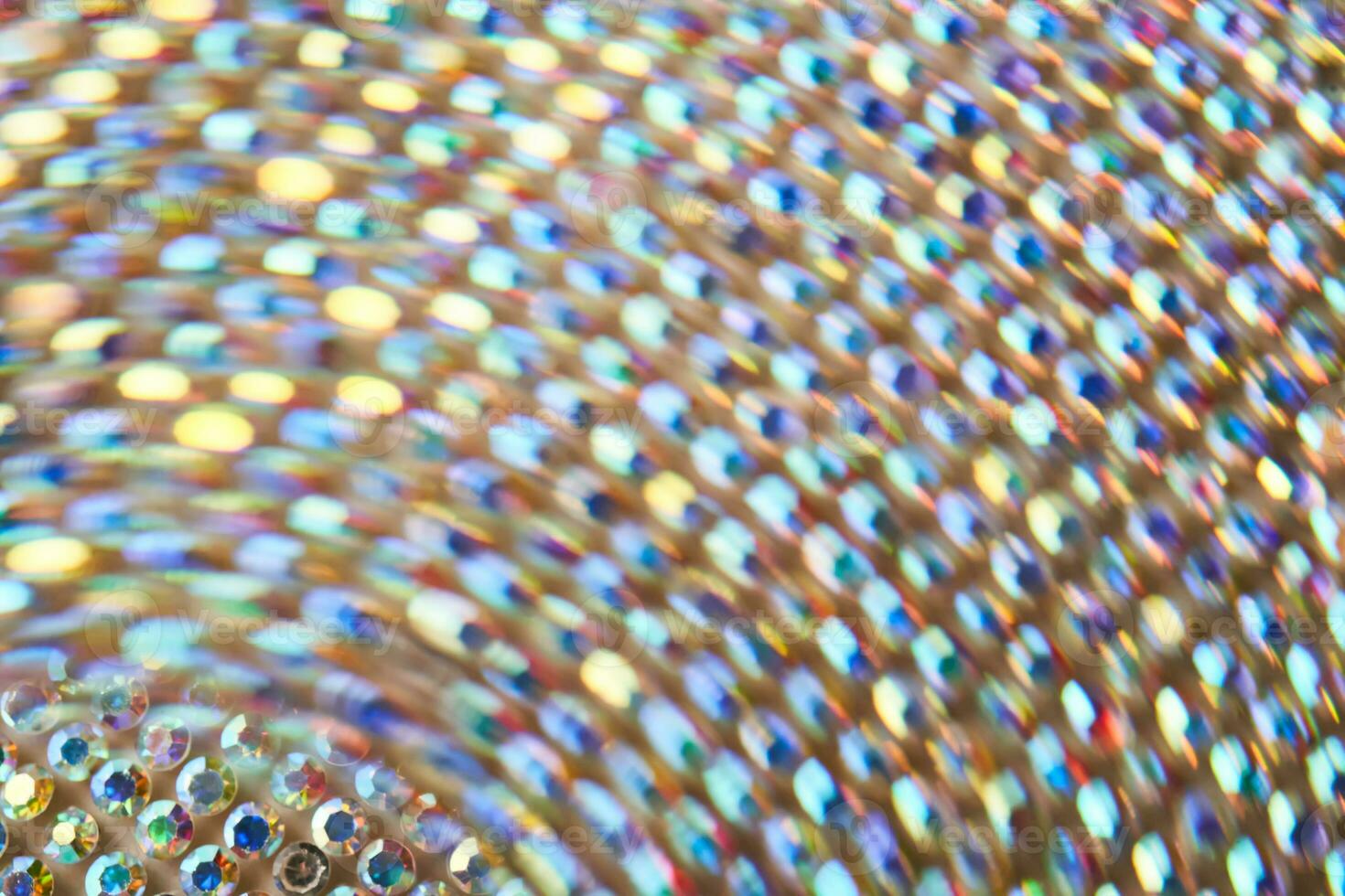 Abstract background made of rhinestones shimmering in the light. photo