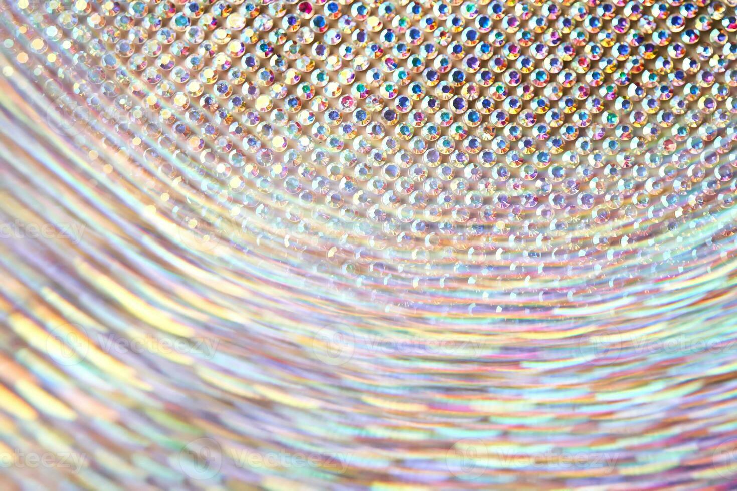 Abstract background made of rhinestones shimmering in the light. photo