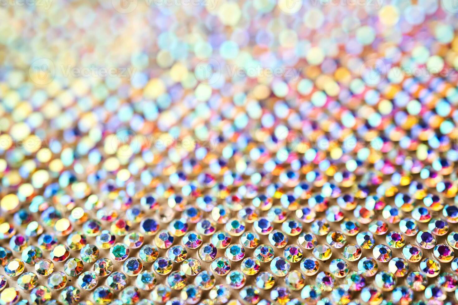 Abstract background made of rhinestones shimmering in the light. photo