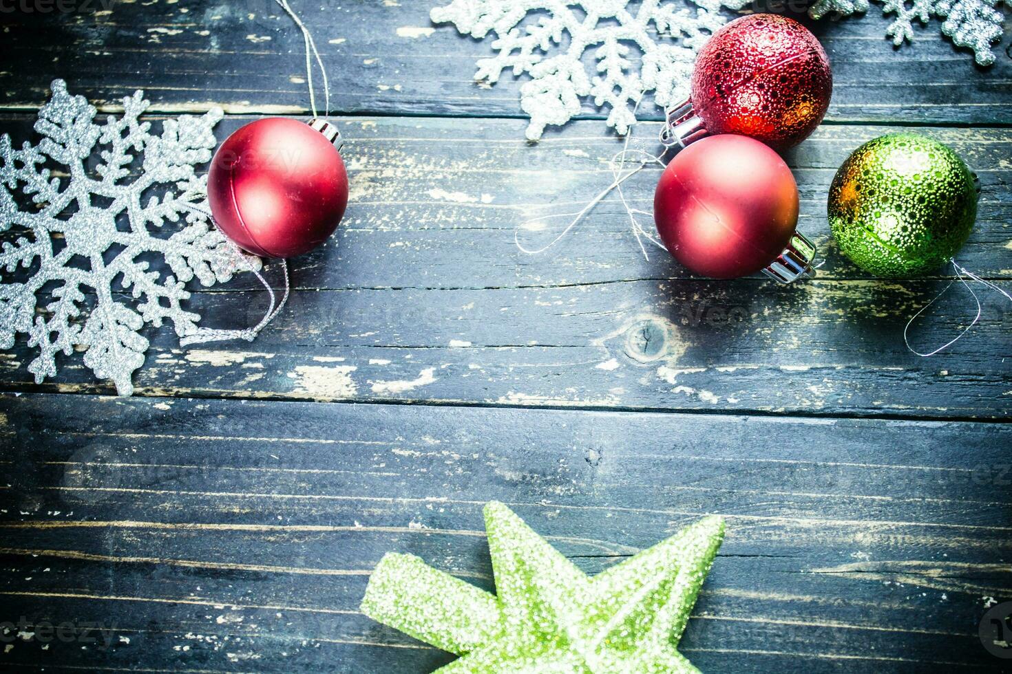 Christmas Holiday Ornaments on a Dark Wood Background. photo