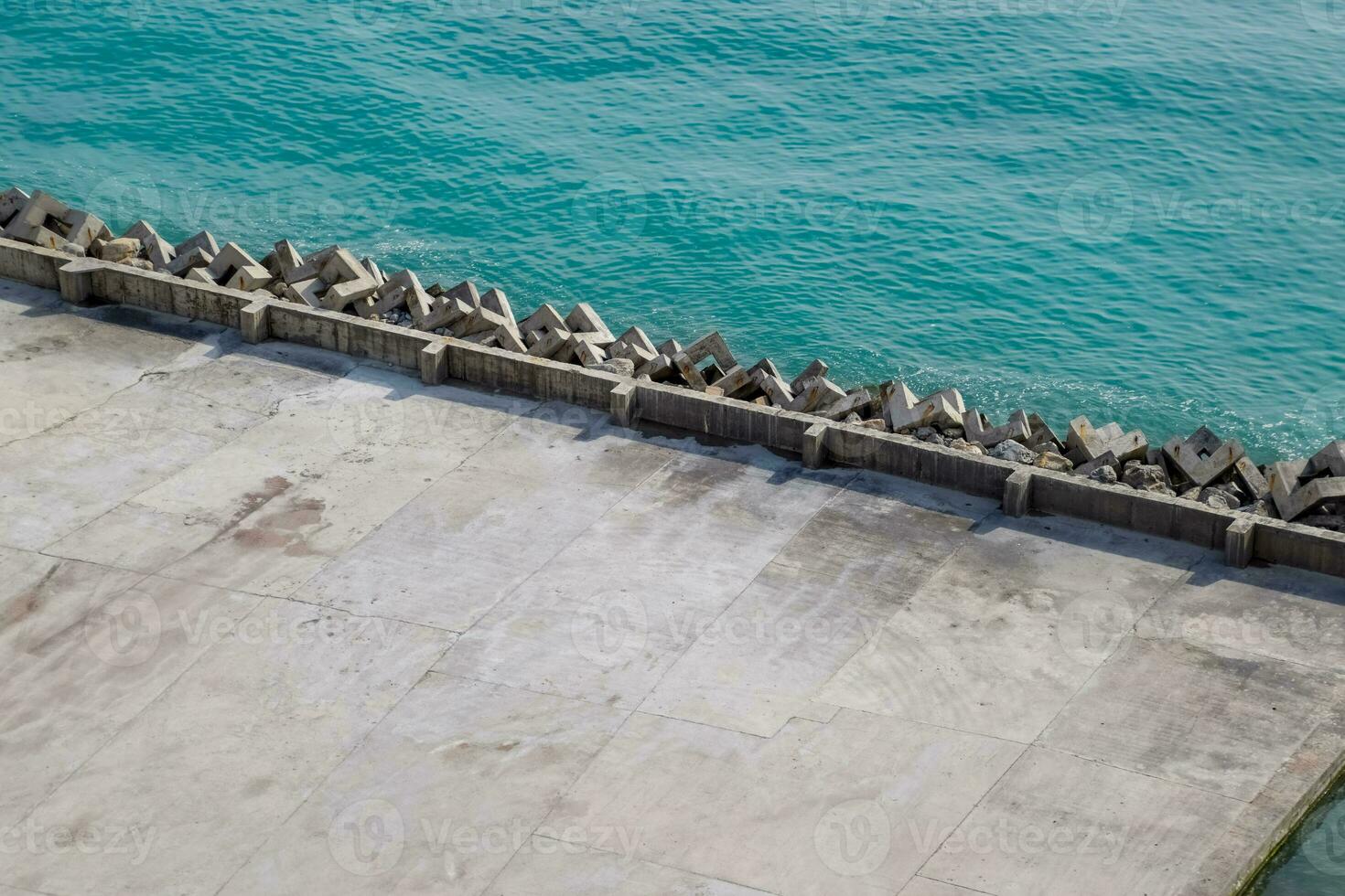 Concrete pier and sea pier on Black Sea, Breakwater at the concrete pier. photo