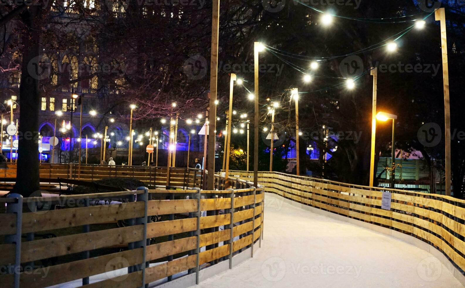 a walkway sketch with lights and benches at night snow in winter photo