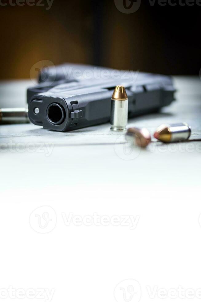 Pistol Handgun and Bullets photo