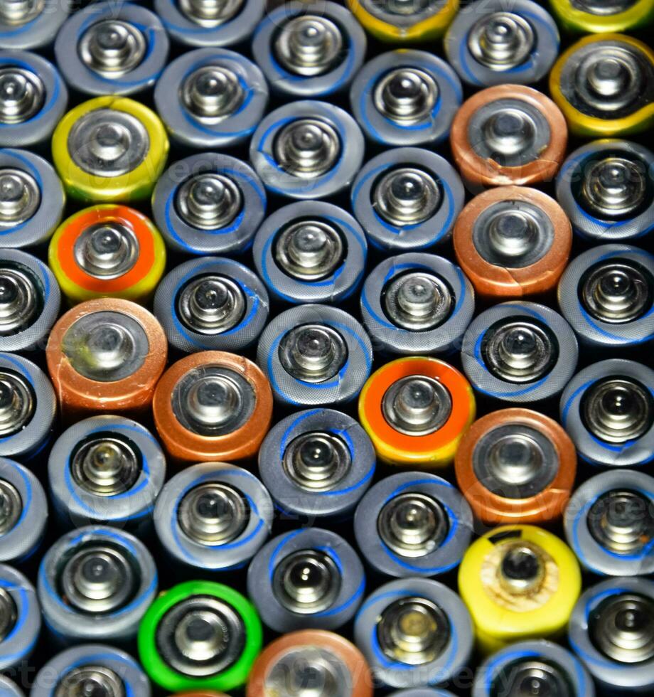 Salt and alkaline batteries, source of energy for portable technology. AAA and AA batteries photo