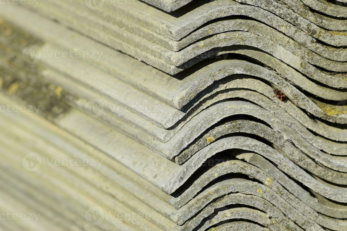 Folded neatly in a pile of old slate. Background of slate. Old b photo