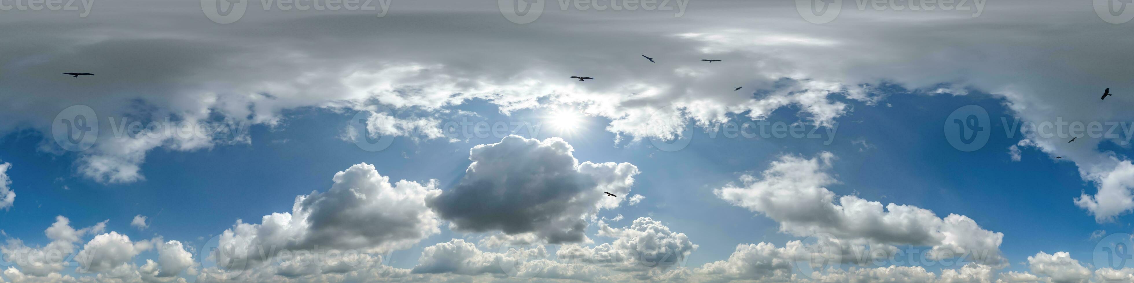 seamless cloudy blue skydome 360 hdri panorama view with flock of birds in awesome clouds with zenith for use in 3d graphics or game as sky dome or edit drone shot photo