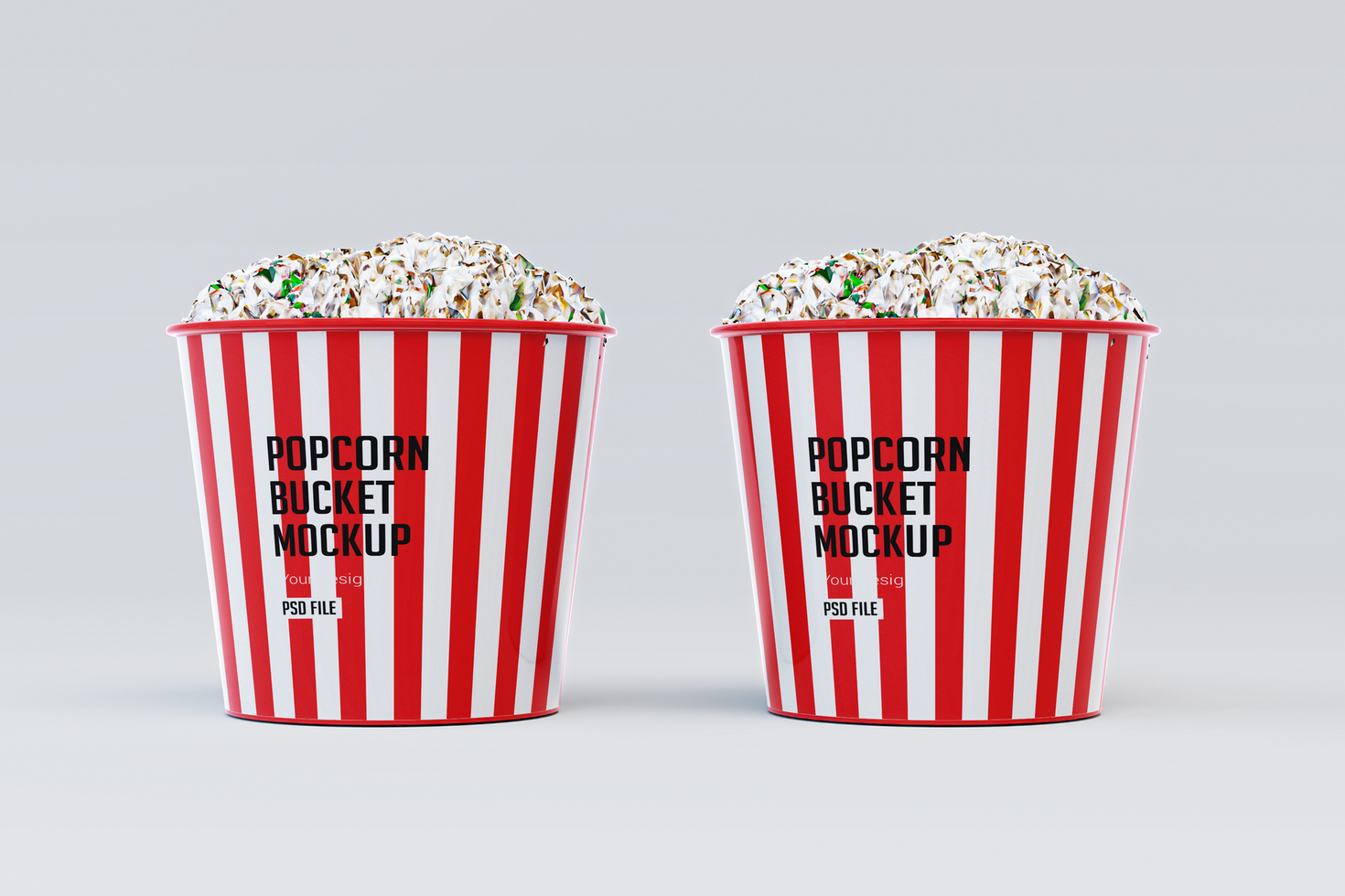 two popcorn buckets with sprinkles on them psd