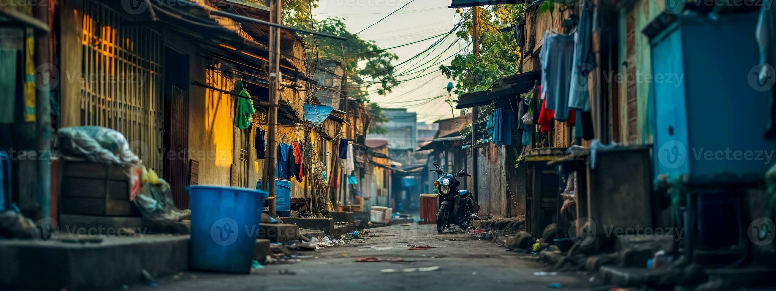 AI Generated narrow alley in a densely populated urban neighborhood, characterized by worn buildings with hanging laundry, litter-strewn ground, reflecting the gritty reality of life in less affluent photo