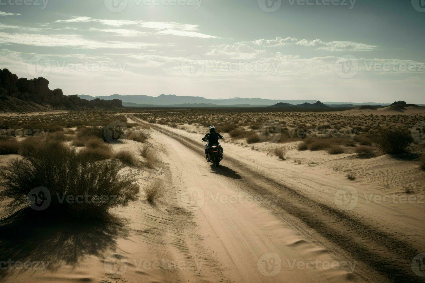 ai generado motocicleta motorista montando en desierto. generar ai foto