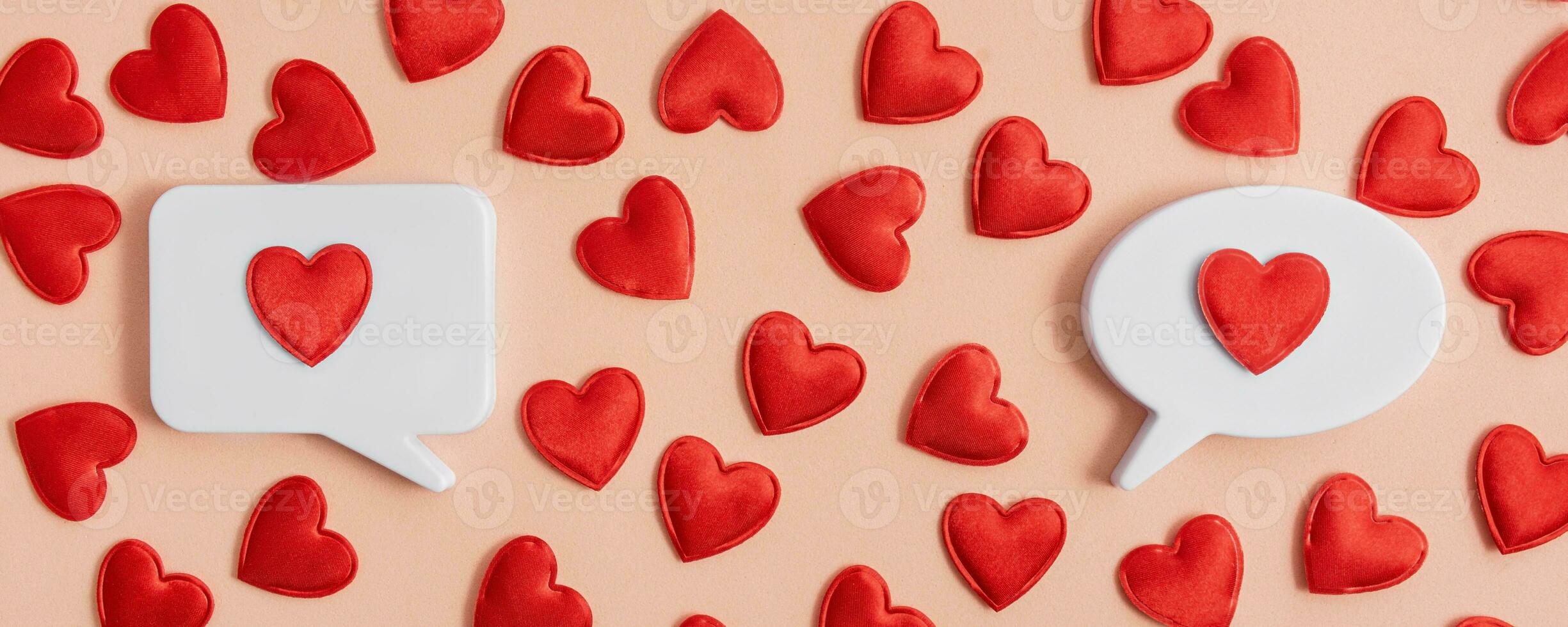 Chat icons with hearts on a light background. Social media concept. Dating online. Love at a distance. Valentine concept. Modern love. Copy space. photo
