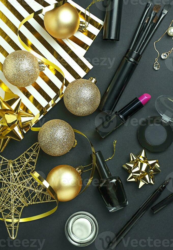 Christmas background. Frame with christmas balls, cosmetics and decorations. New Year card. photo