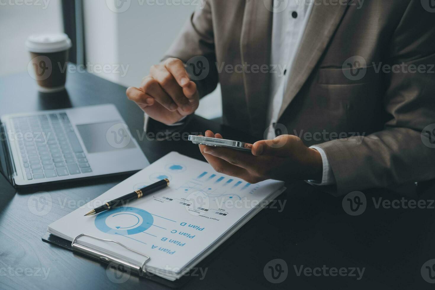 Audit concept,Administrator business man financial inspector and secretary making report calculating balance. Internal Revenue Service checking document. photo
