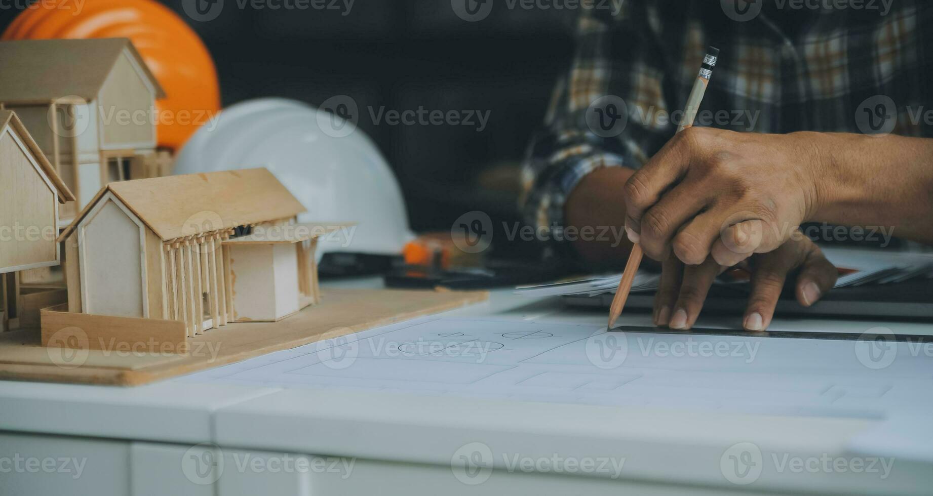 Construction and structure concept of Engineer or architect meeting for project working with partner and engineering tools on model building and blueprint in working site, contract for both companies. photo