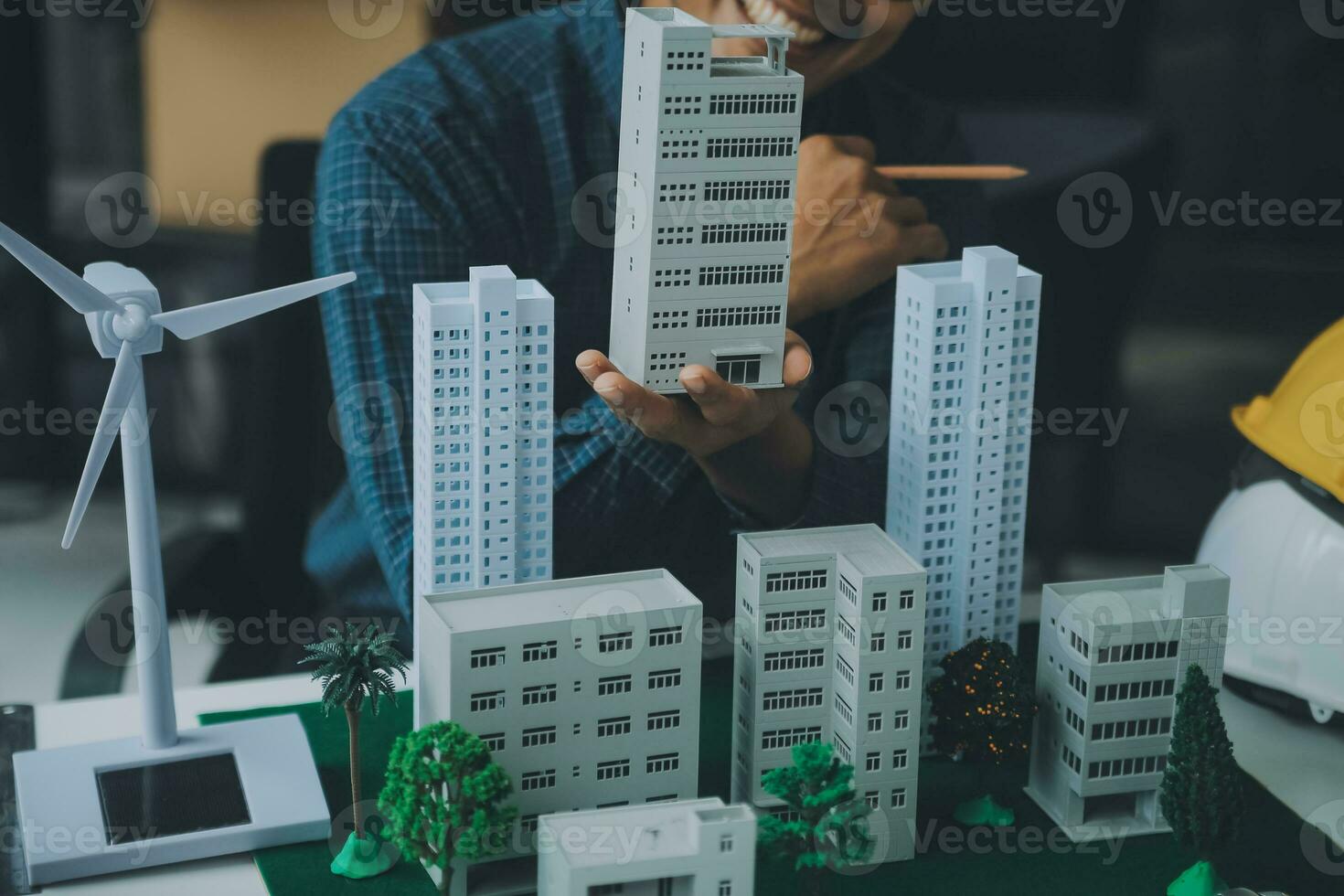 Construction and structure concept of Engineer or architect meeting for project working with partner and engineering tools on model building and blueprint in working site, contract for both companies. photo