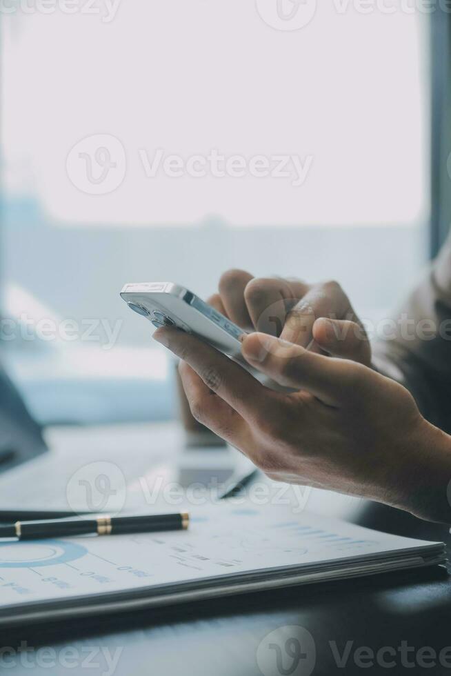 Audit concept,Administrator business man financial inspector and secretary making report calculating balance. Internal Revenue Service checking document. photo