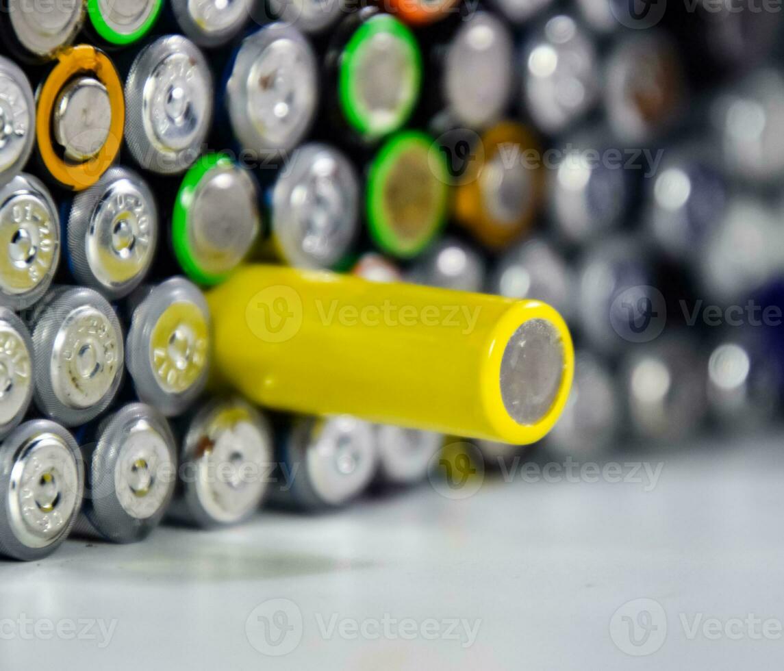 Salt and alkaline batteries, source of energy for portable technology. AAA and AA batteries photo