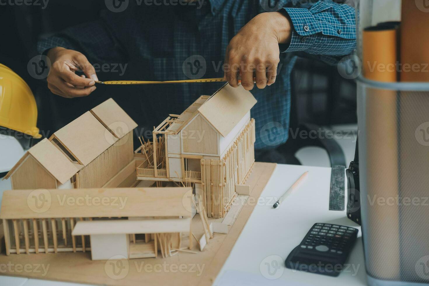 Construction and structure concept of Engineer or architect meeting for project working with partner and engineering tools on model building and blueprint in working site, contract for both companies. photo