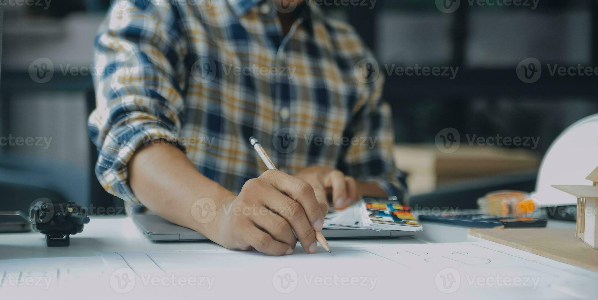 Construction and structure concept of Engineer or architect meeting for project working with partner and engineering tools on model building and blueprint in working site, contract for both companies. photo