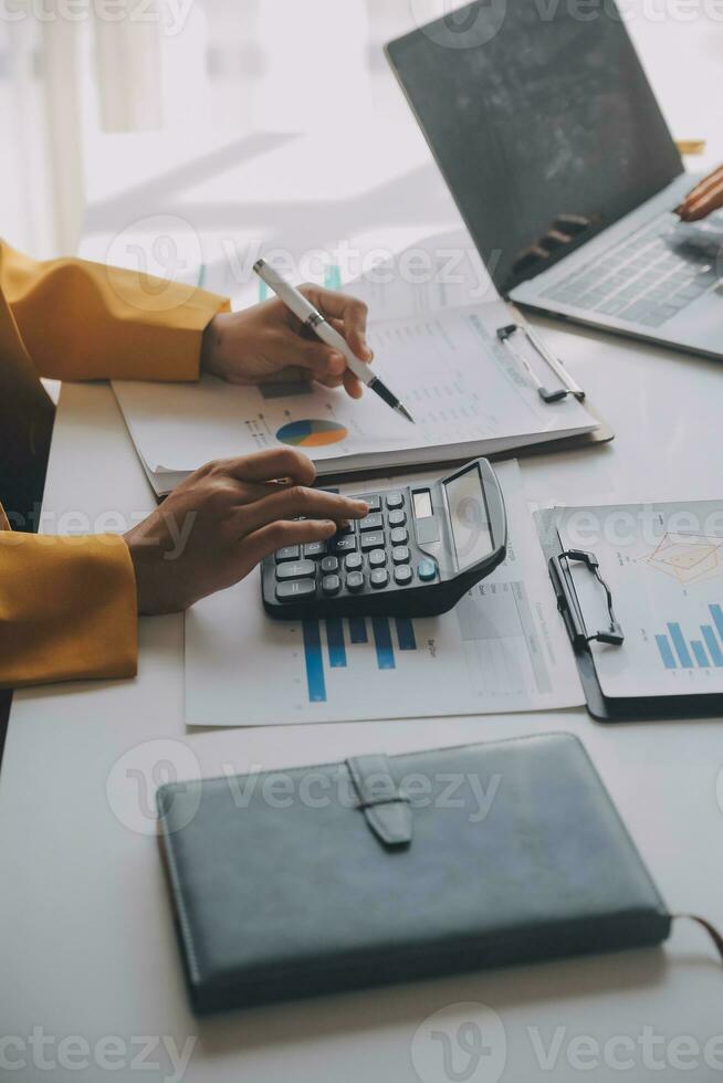 Team of business people working together in the meeting room office, teamwork background charts and graphs banner, double exposure successful teamwork,business planning concept. photo
