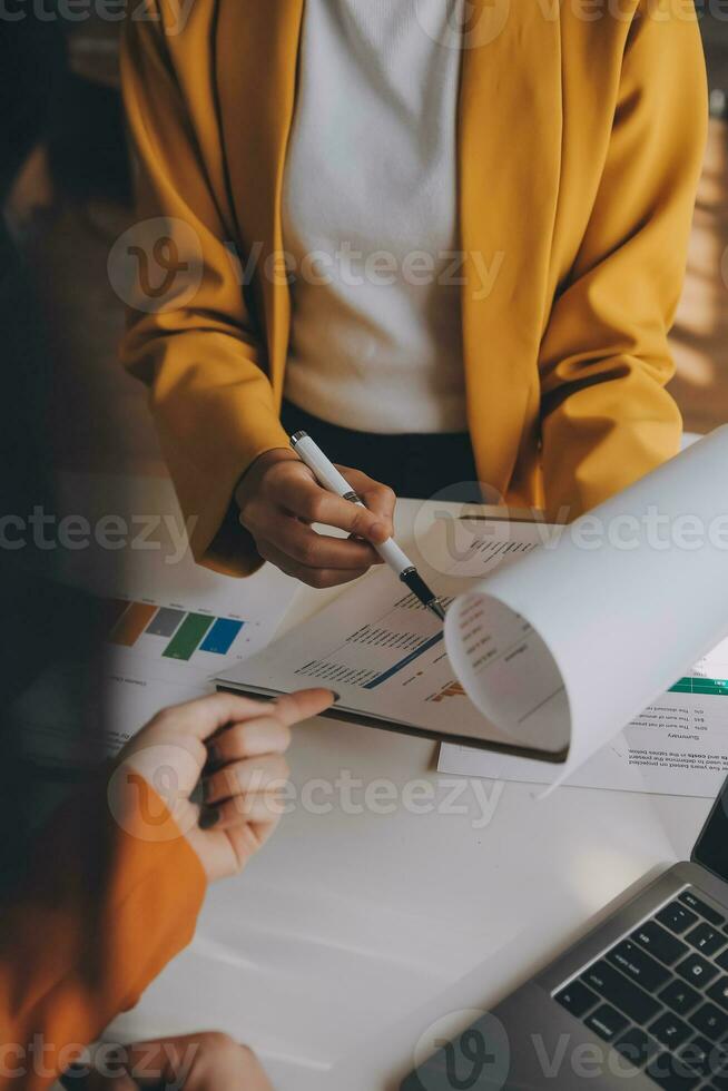 Team of business people working together in the meeting room office, teamwork background charts and graphs banner, double exposure successful teamwork,business planning concept. photo