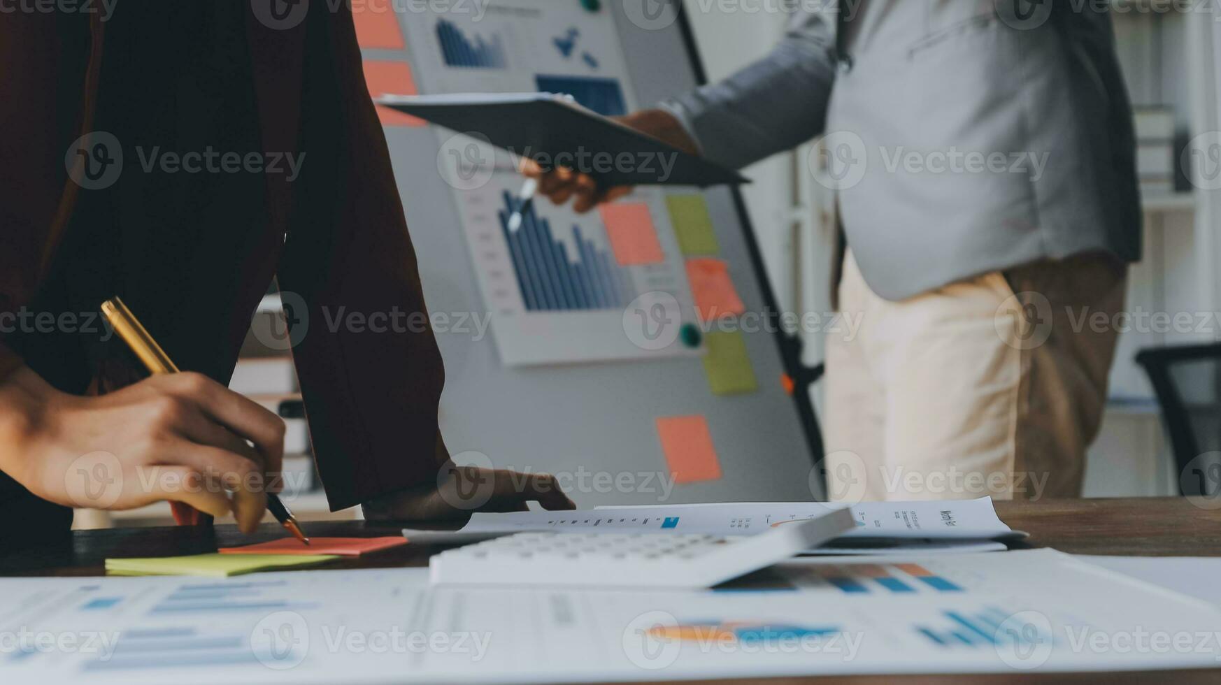 Close up of Business team analyzing income charts and graphs with modern laptop computer. Business analysis and strategy concept. photo