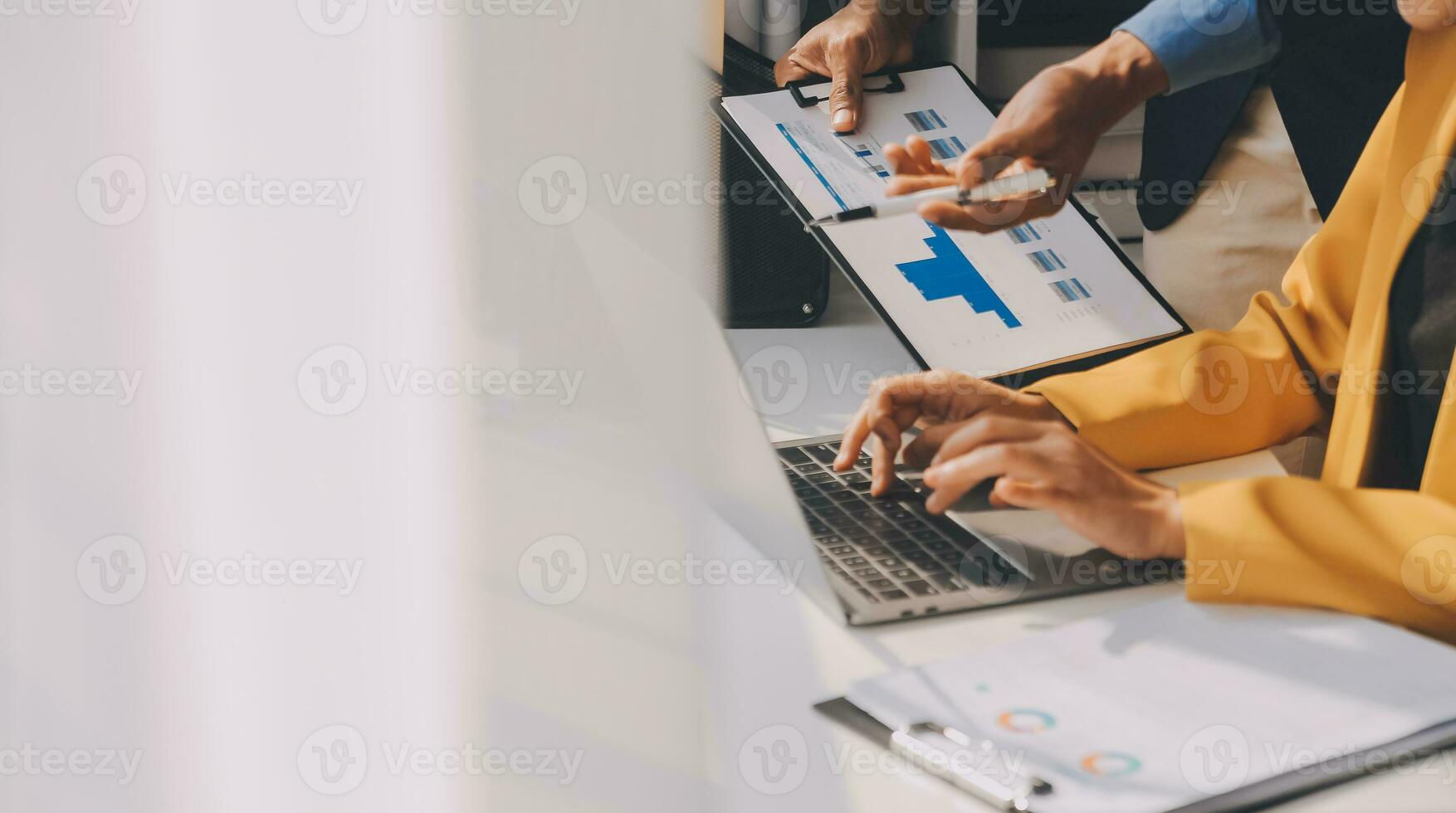 Close up of Business team analyzing income charts and graphs with modern laptop computer. Business analysis and strategy concept. photo