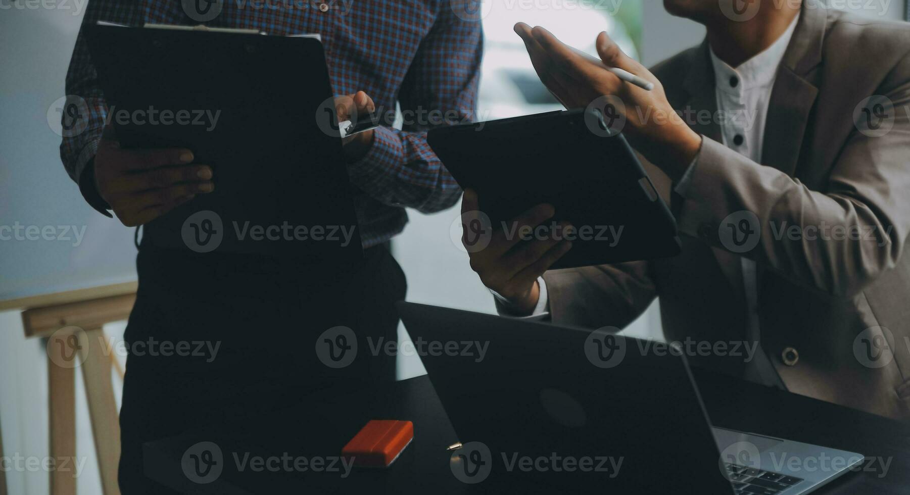 Audit concept,Administrator business man financial inspector and secretary making report calculating balance. Internal Revenue Service checking document. photo