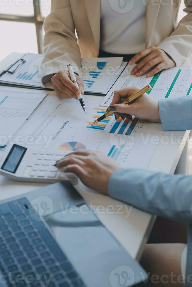 Team of business people working together in the meeting room office, teamwork background charts and graphs banner, double exposure successful teamwork,business planning concept. photo
