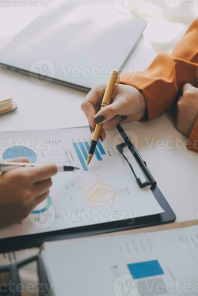 Team of business people working together in the meeting room office, teamwork background charts and graphs banner, double exposure successful teamwork,business planning concept. photo
