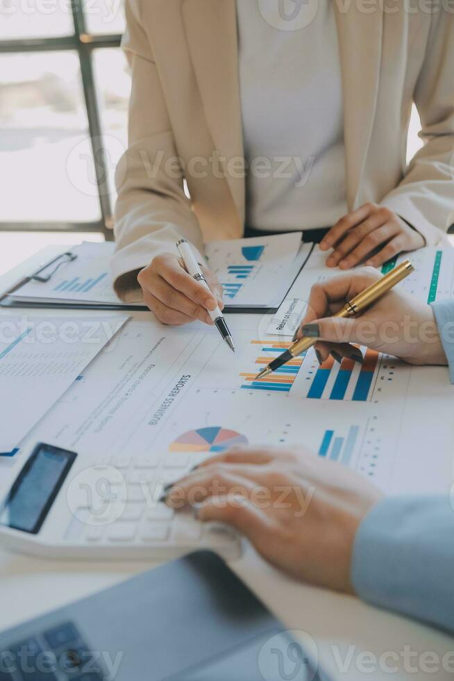 Team of business people working together in the meeting room office, teamwork background charts and graphs banner, double exposure successful teamwork,business planning concept. photo