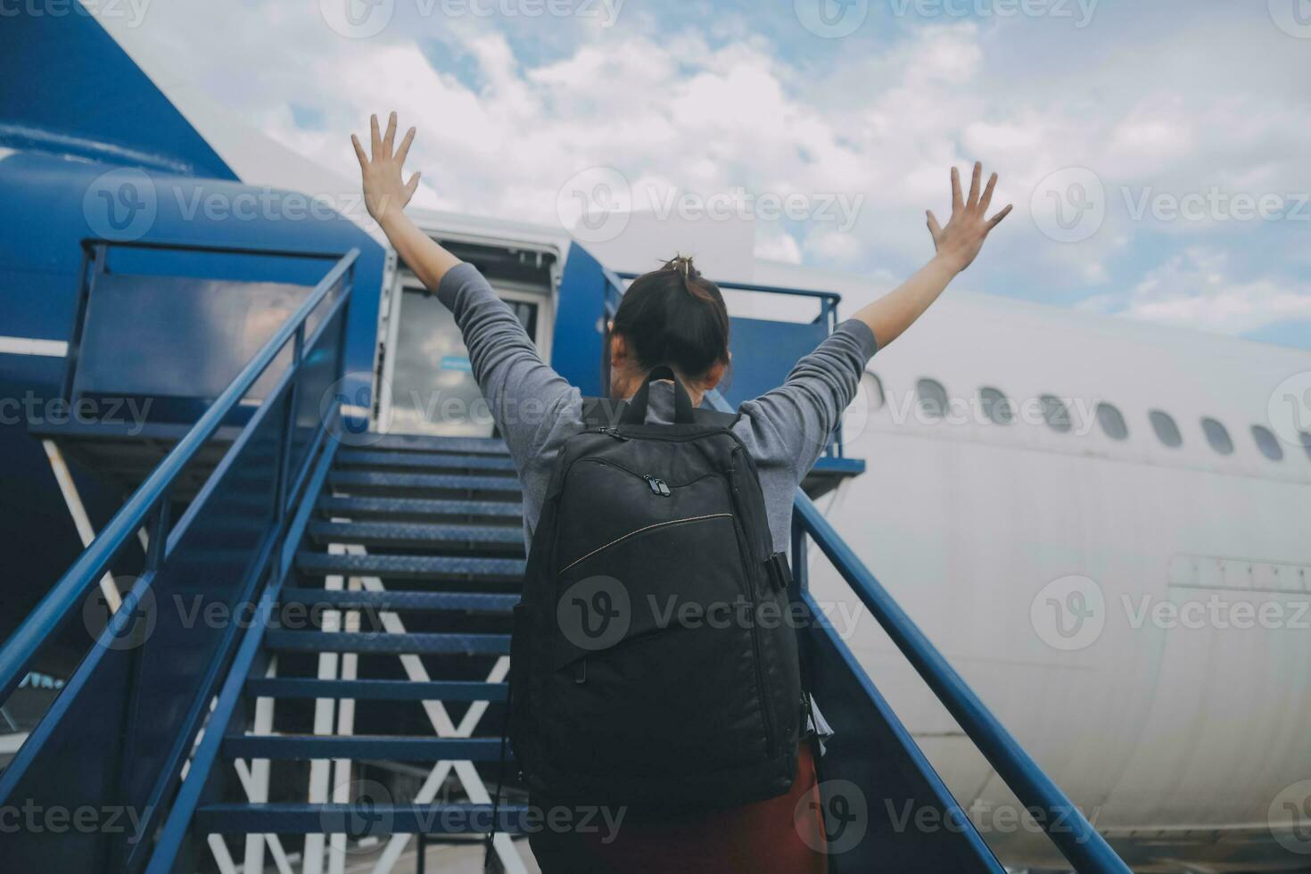 Happy attractive asian woman traveler with backpack at the modern airport terminal, copy space, Tourist journey trip concept photo