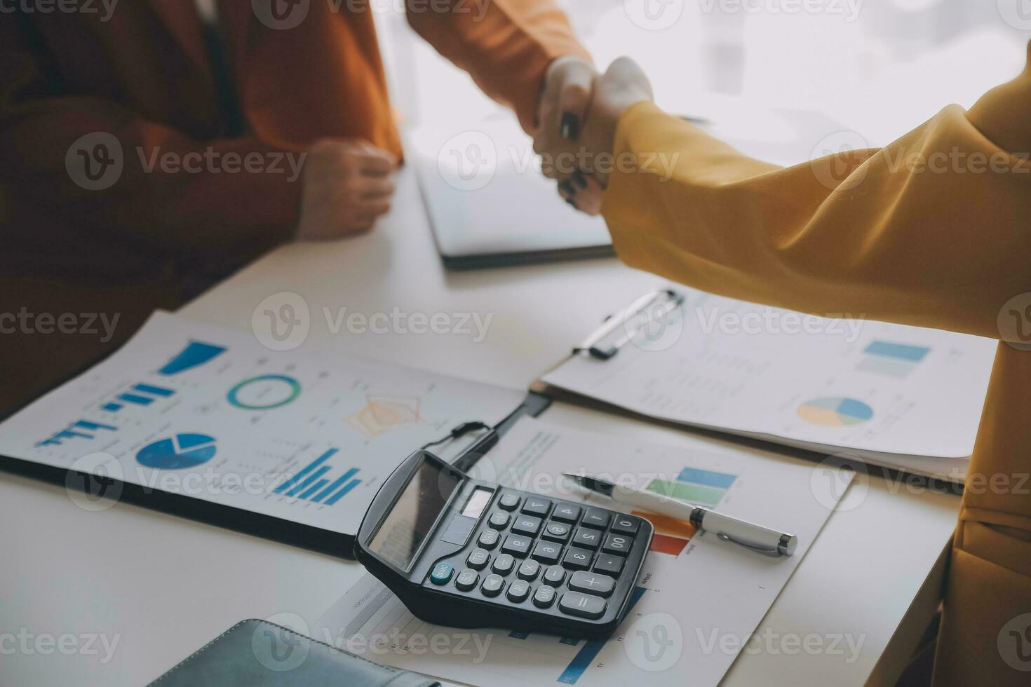 Team of business people working together in the meeting room office, teamwork background charts and graphs banner, double exposure successful teamwork,business planning concept. photo