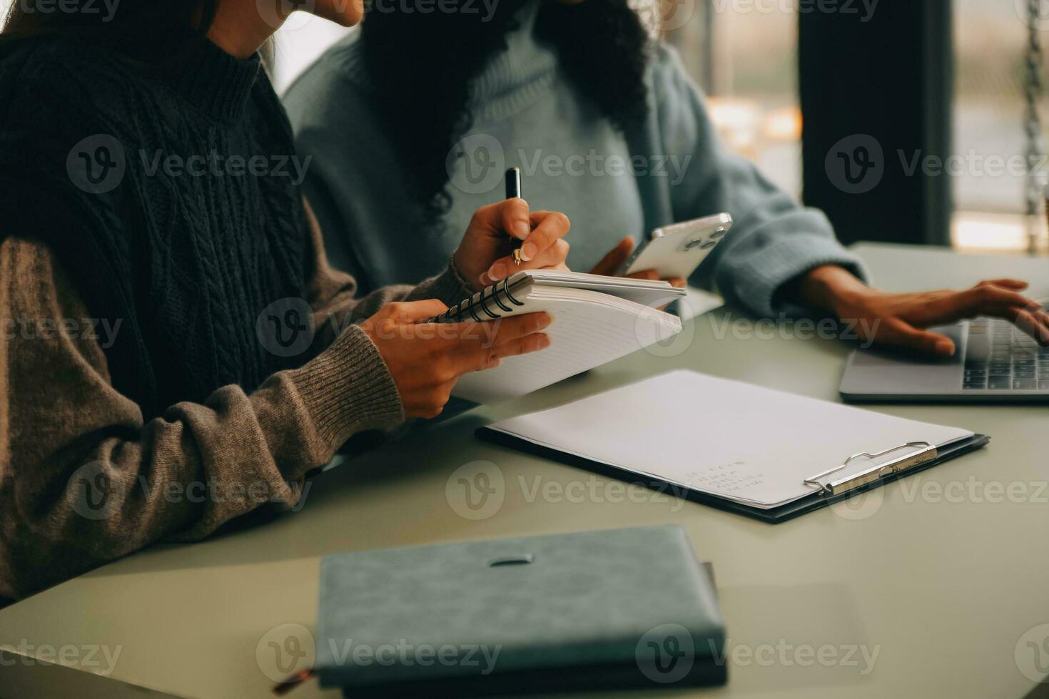 Asian businesswoman working on laptop computer Look for job online, freelance looking and typing on notebook on table, lifestyle of woman studying online photo