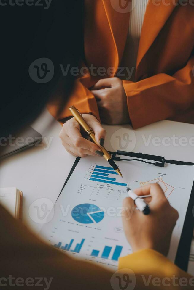 Team of business people working together in the meeting room office, teamwork background charts and graphs banner, double exposure successful teamwork,business planning concept. photo