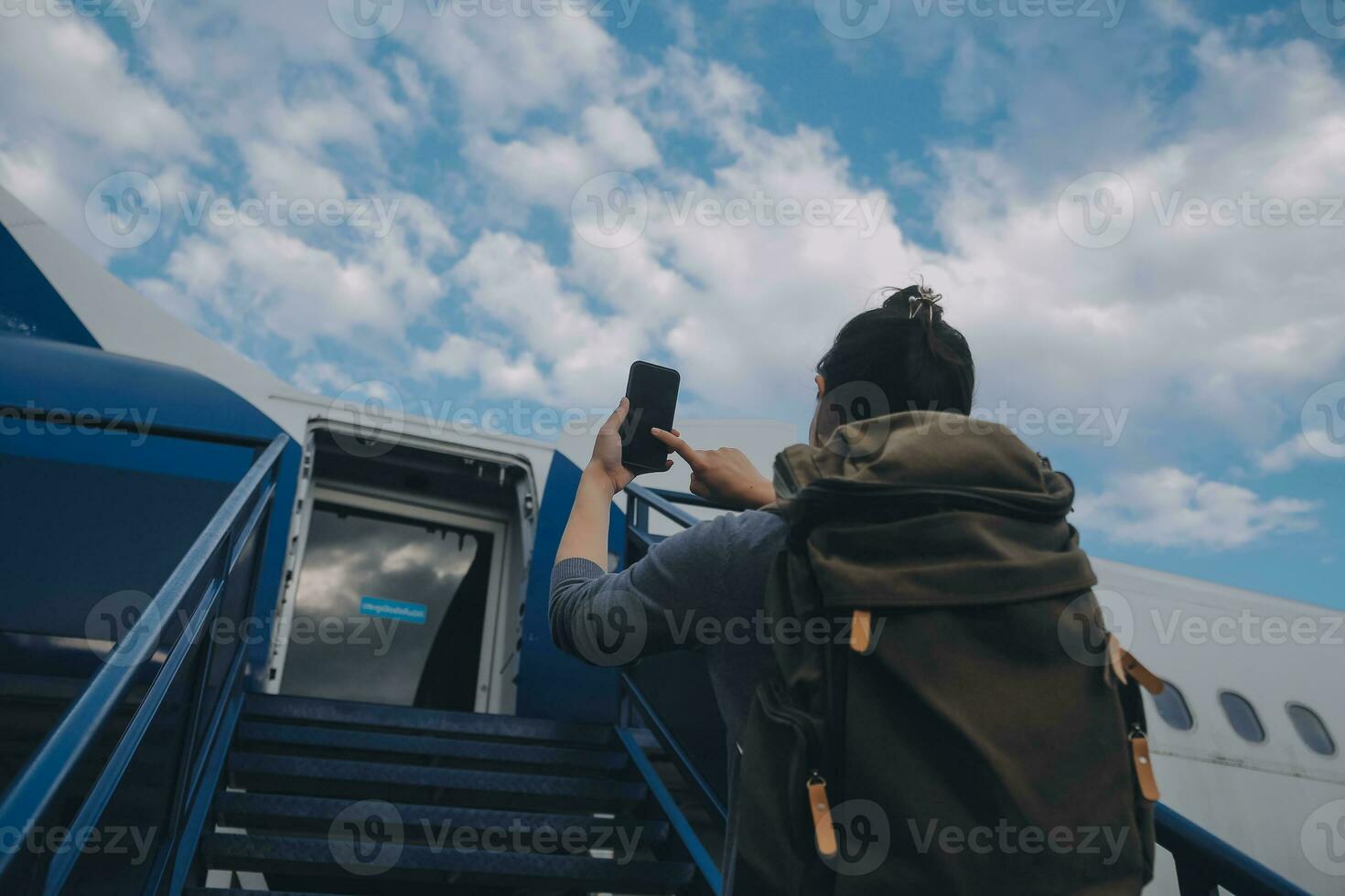 Happy attractive asian woman traveler with backpack at the modern airport terminal, copy space, Tourist journey trip concept photo