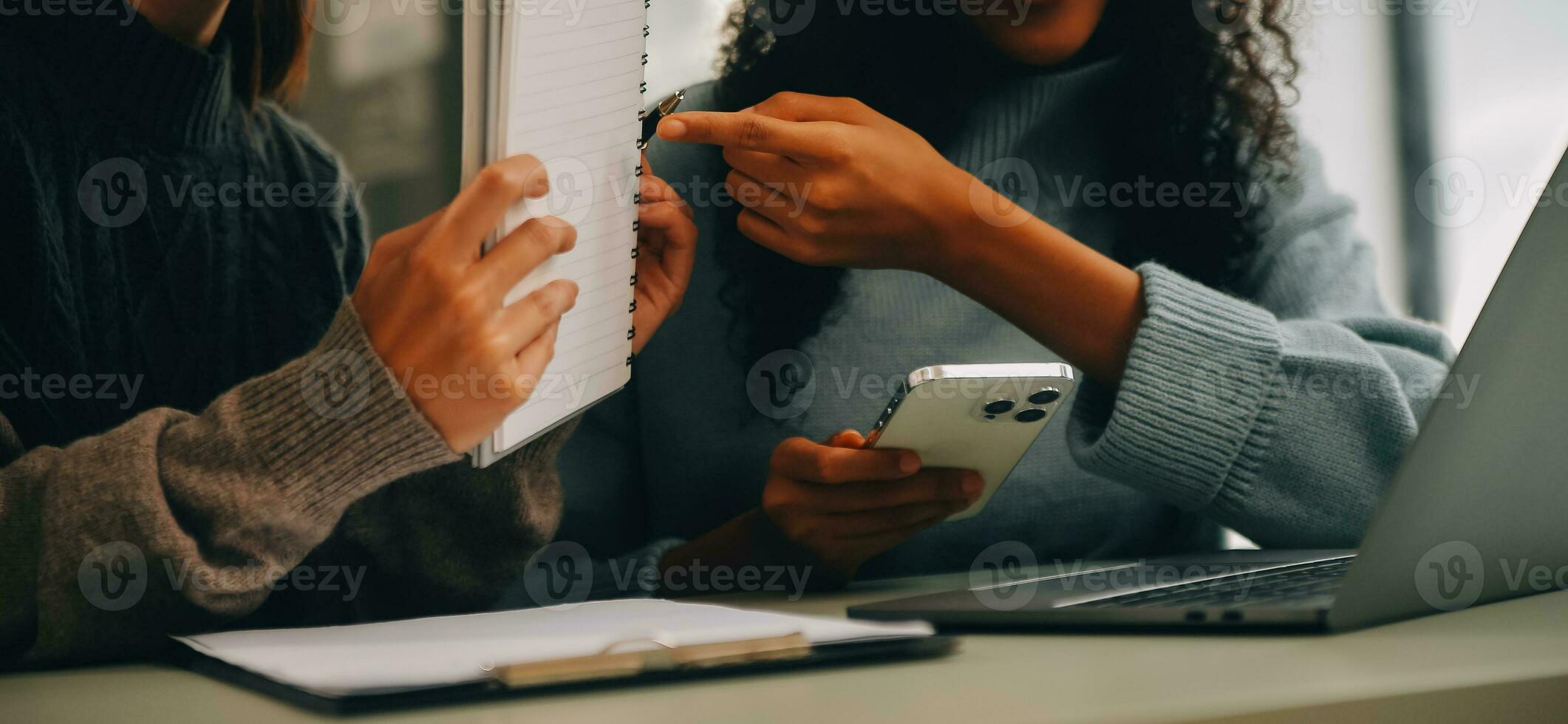 Asian businesswoman working on laptop computer Look for job online, freelance looking and typing on notebook on table, lifestyle of woman studying online photo