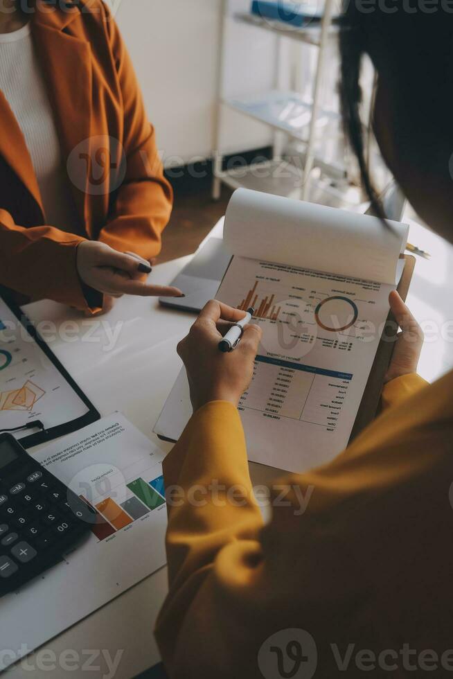 Team of business people working together in the meeting room office, teamwork background charts and graphs banner, double exposure successful teamwork,business planning concept. photo