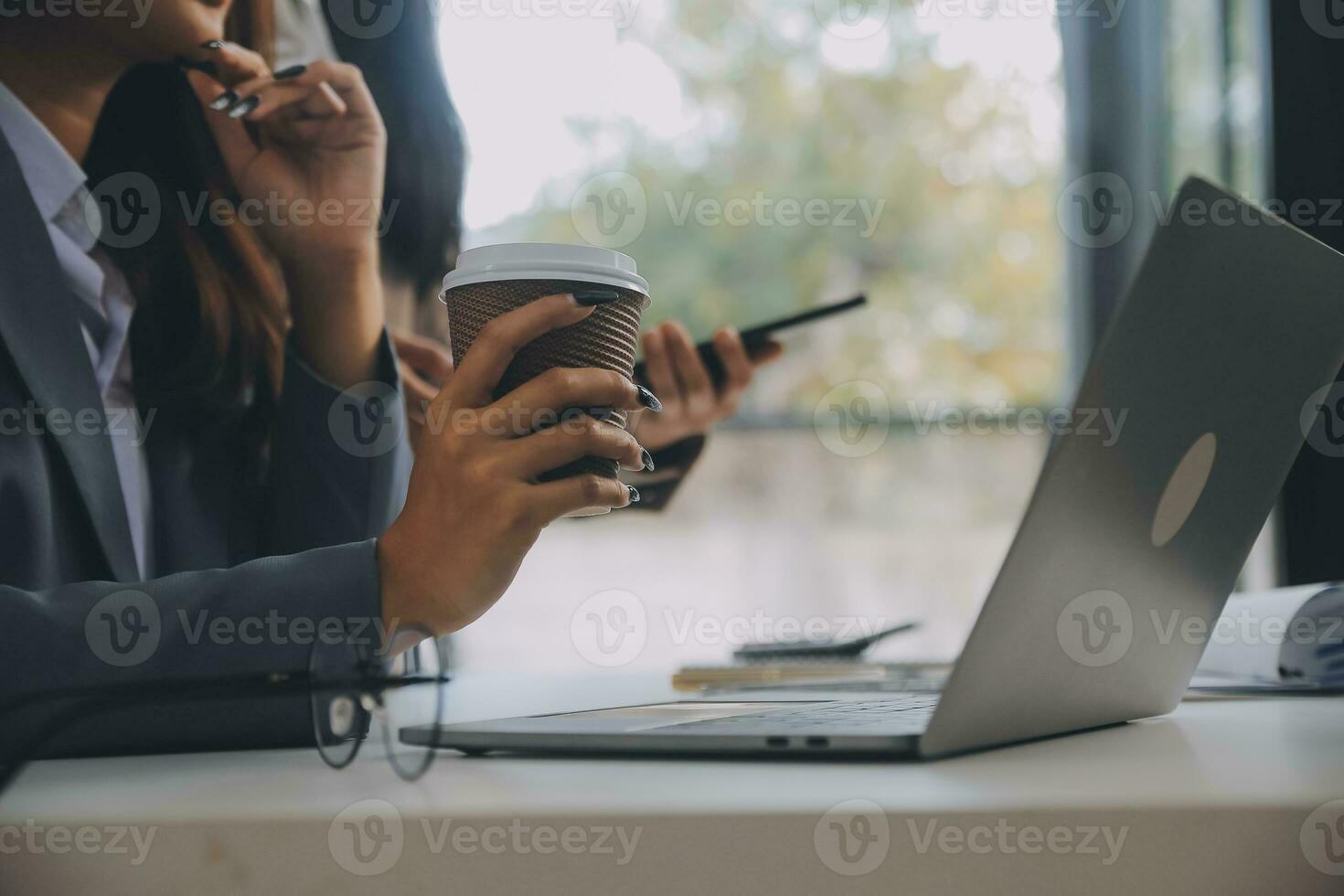 Co working conference, Business team meeting present, investor colleagues discussing new plan financial graph data on office table with laptop and digital tablet, Finance, accounting, investment. photo