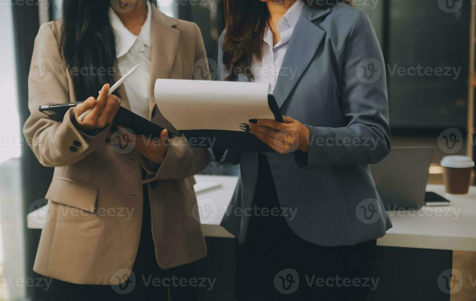 Co working conference, Business team meeting present, investor colleagues discussing new plan financial graph data on office table with laptop and digital tablet, Finance, accounting, investment. photo