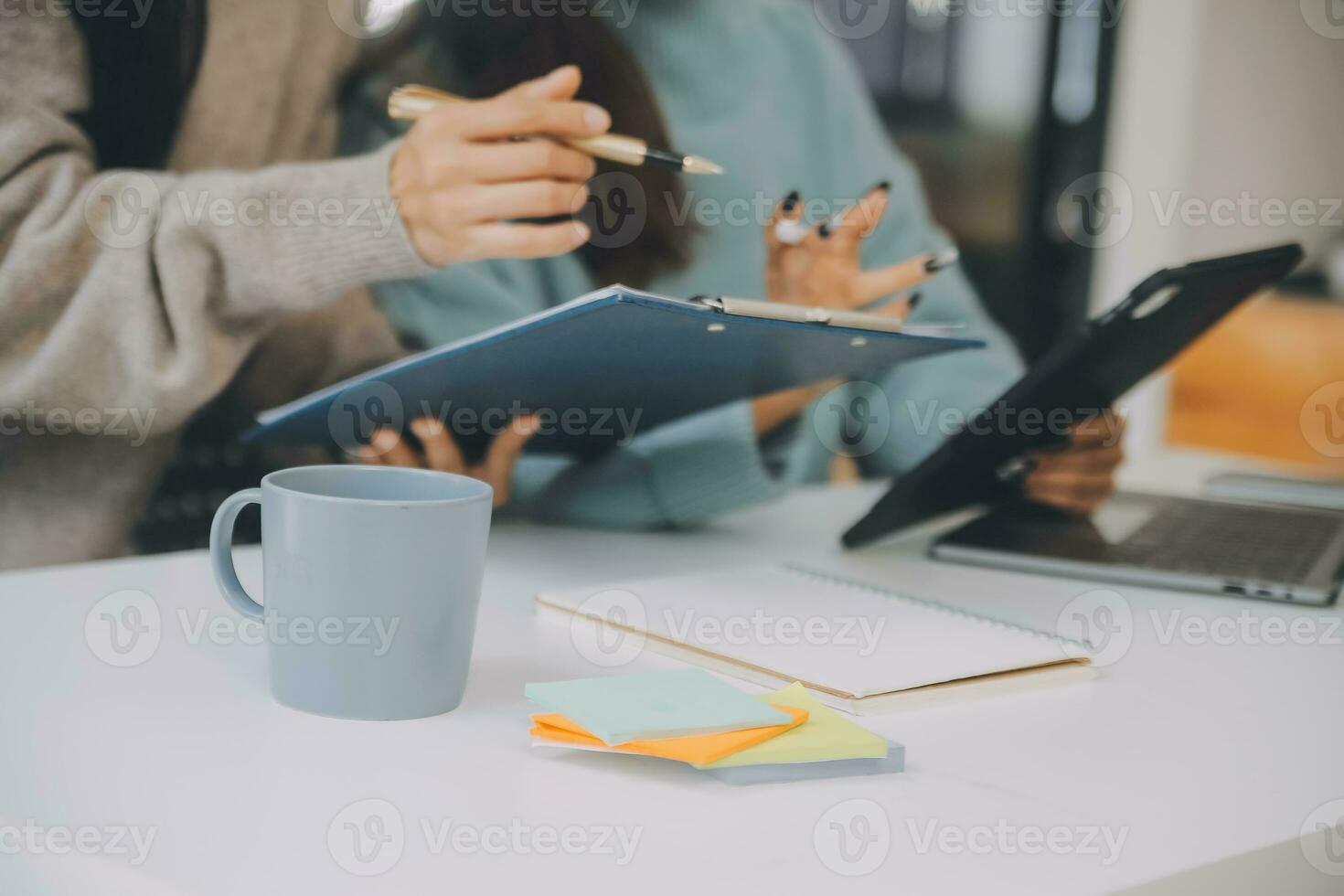 Co working conference, Business team meeting present, investor colleagues discussing new plan financial graph data on office table with laptop and digital tablet, Finance, accounting, investment. photo